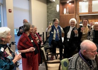 Seniors socialize at Newton, MA's senior living community Lasell Village.