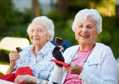 Residents attend education lecture at senior retirement community Lasell Village in Newton, MA, where lifelong learning is a way of life.