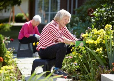 Classes include gardening at Massachusetts active senior retirement community Lasell Village, where lifelong learners thrive.