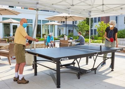 Ping pong is a fun part of Lasell Village's active senior lifestyle.